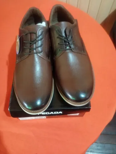 Sapatos pegada novo na caixa número 42 zerado por 190$