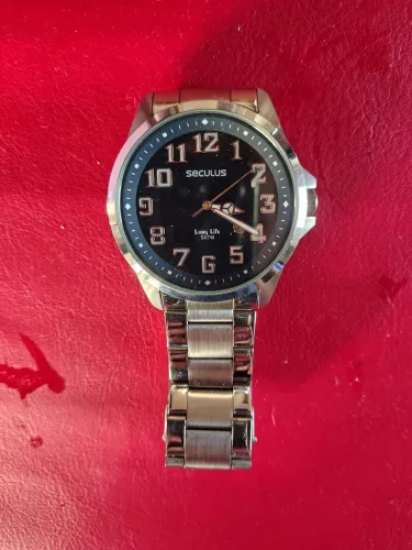 Vendo relógio de pulso funcionando perfeitamente...