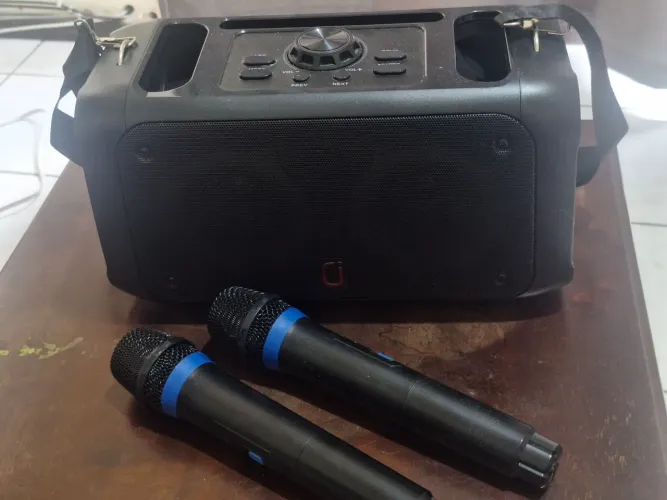 Aparelho de som com karaoke