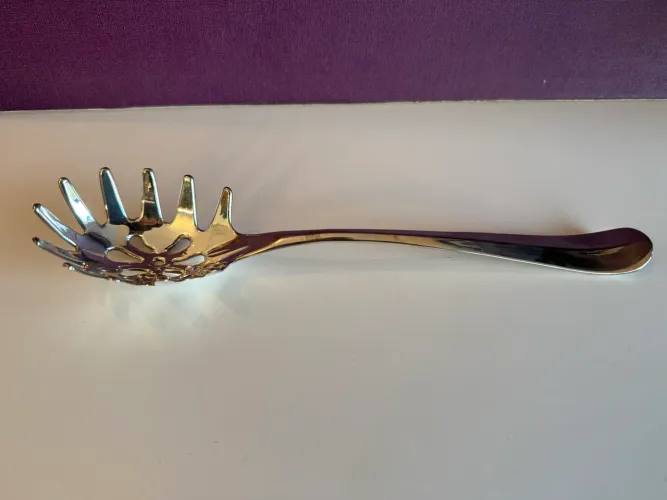 Pegador de macarrão em prata