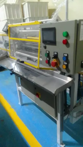 Máquina de cortar e enrolar atadura
