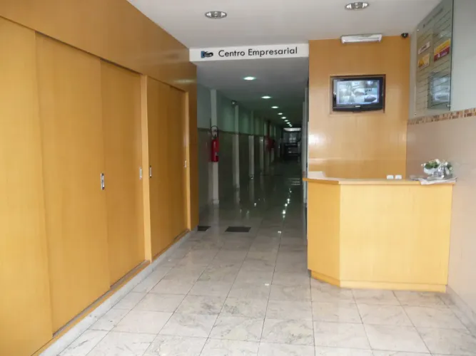 loja dentro de centro empresarial com banda larga e ar condicionado instalados
