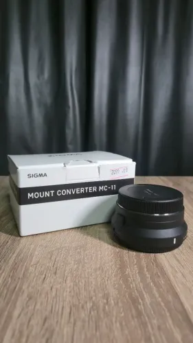 Adaptador Sigma MC-11 Canon EF para Sony E - Estado de Novo