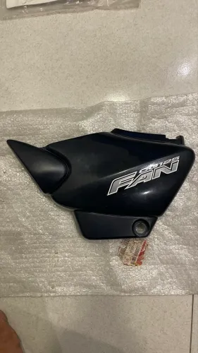 Tampa lateral fan 125 nova sem uso original 