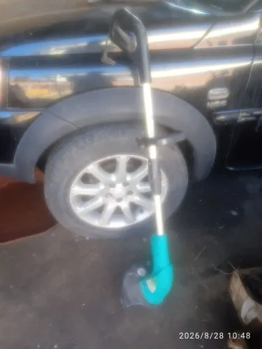 Máquina Roçadeira de cortar grama Garthem elétrica 110v 1500w corta até mato grande