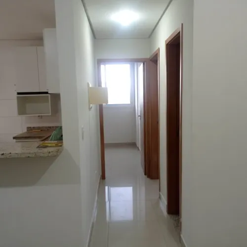 APARTAMENTO COM DOIS QUARTOS COM UMA SUÍTE E COM UMA VAGA GARAGEM DESOCUPADO