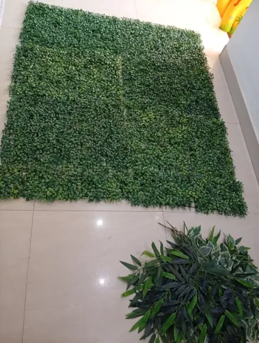 Planta artificial decoração parede