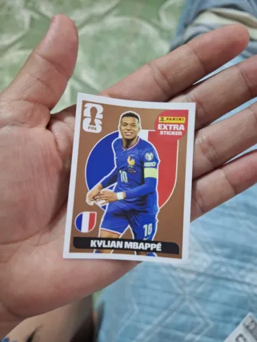 Figurinha do Mbappé Extra Sticker bronze copa do mundo 2026