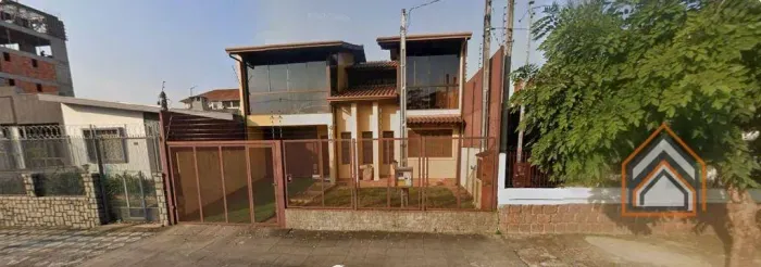 Sobrado com 6 dormitórios para alugar, 320 m² por R$ 8.700/mês - Jardim São Pedro - Porto 