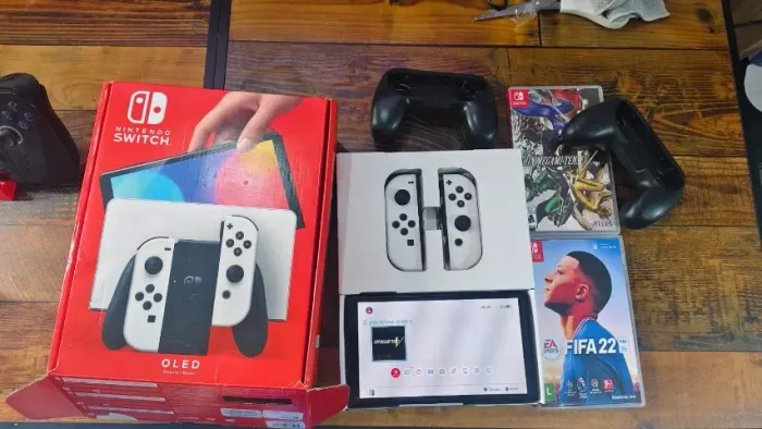 Nintendo switch Oled original Impecável com 2 jogos fisicos