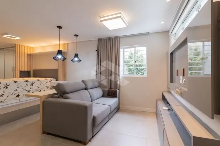 Triplex para alugar com 4 suítes e 2 vagas de garagem no Centro