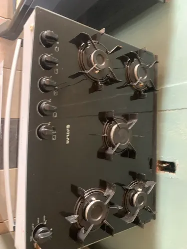 Vendo esse fogão semi novo atlas mesa de vidro