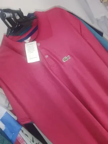 Camisa polo 30$