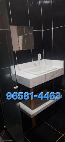 Pia esculpida em porcelanato.