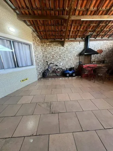 Casa com 3 dormitórios à venda, 100 m² por R$ 550.000,00 - Tude Bastos - Praia Grande/SP