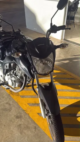 Moto super nova pouco km unico dono