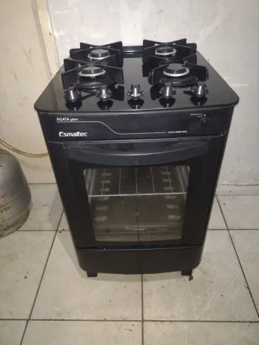 Fogão esmaltec 4 bocas todo de vidro semi novo pra hj temos entrega não e elétrico ac.cart