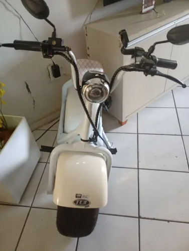 Moto elétrica com nota fiscal um ano comprada 2 chave reserva uma capa manual