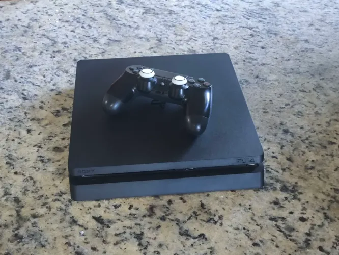 Playstation 4 slim 500gb, + um controle e 9 games