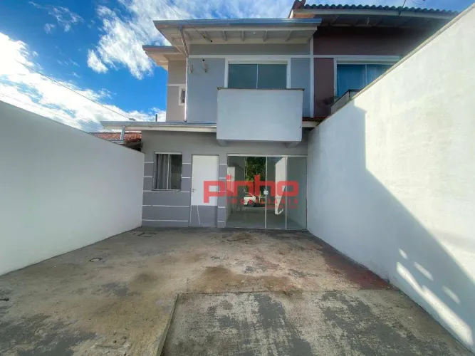 Casa com 2 dormitórios para alugar, 60 m² por R$ 2.572,78/mês - Forquilhas - São José/SC