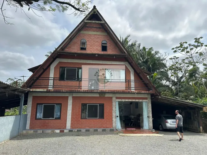 Terreno com 9.292 m2, de frente para o asfalto, Estrada Timbé, com 2 casas, galpão, rancho