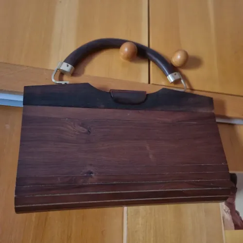 Bolsa de Madeira de lei e couro NUNCA USADA