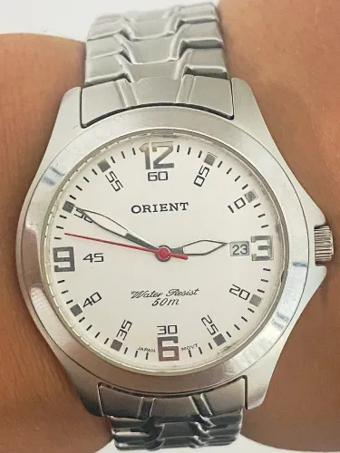 Relógio Orient quartz.