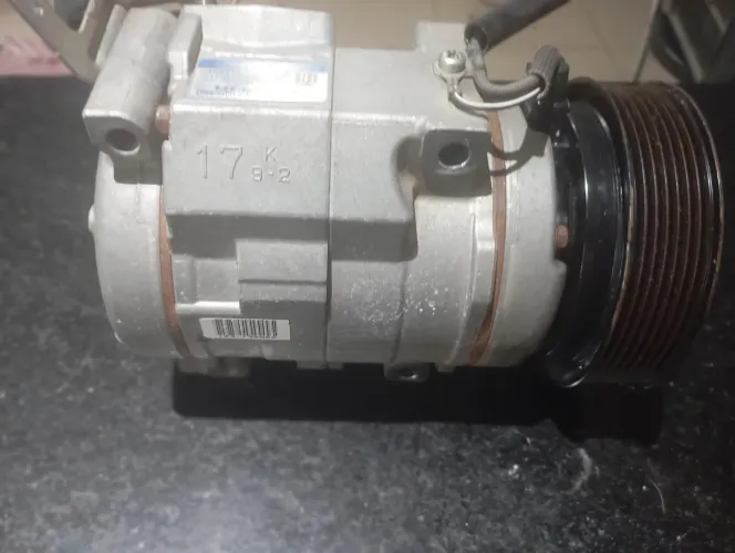 Compressor do ar condicionado Pajero full 3.8 gasolina 