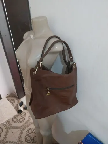 Bolssa de couro original da marca origami valor 100 reais