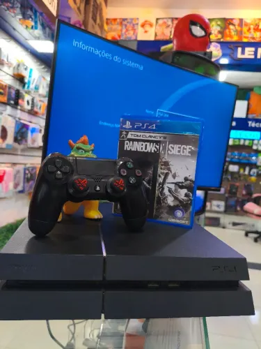 PlayStation 4 Fat Versão Desbloqueio + 1 Ano de Garantia - Loja Física