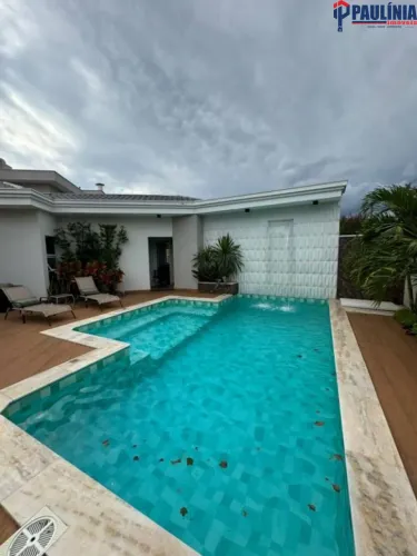 Sobrado com 4 dormitórios à venda, 450 m² por R$ 4.100.000 - Villa Lobos - Paulínia/SP