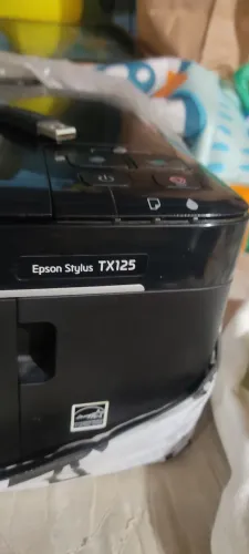 Impressora Epson stylus TX125 vai com alguns cartucho que tenho aqui de brinde 