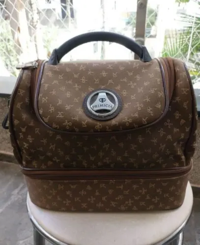 Frasqueira bolsa primicia estampa marrom largura 32cm altura 32cm
