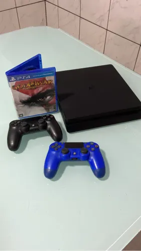 Vendo ps4 slim 500 gb 2 controles se vier buscar faço menos