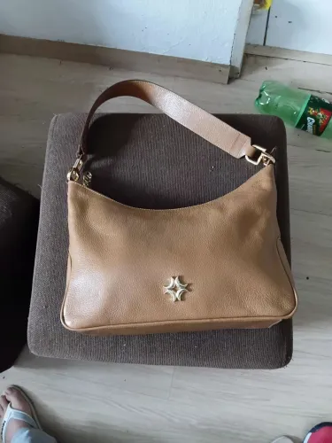 Vendo uma bolsa de couro legítimo luz da lua original