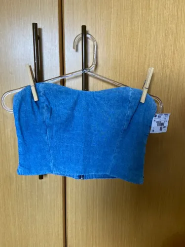 Na etiqueta Top Cropped Jeans Azul