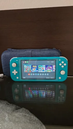 Nintendo switch lite desbloqueado "IMPECÁVEL" 128gb cheio de jogos +1 Bolsa case.