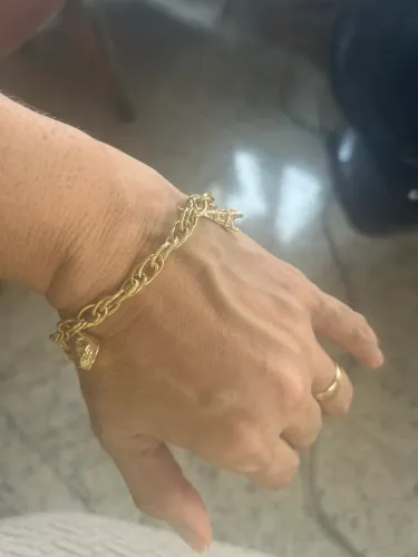 Pulseira de ouro 18k 750 com berloques das maravilhas do mundo.