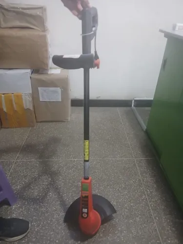 Aparador Grama Tramontina Roçadeira Cortador Eletrico 1500v 220v Laranja E Preto