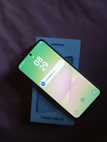 Vendo celular A56 completo estado de novo
