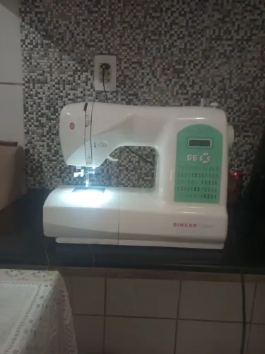 Máquina de costura singer