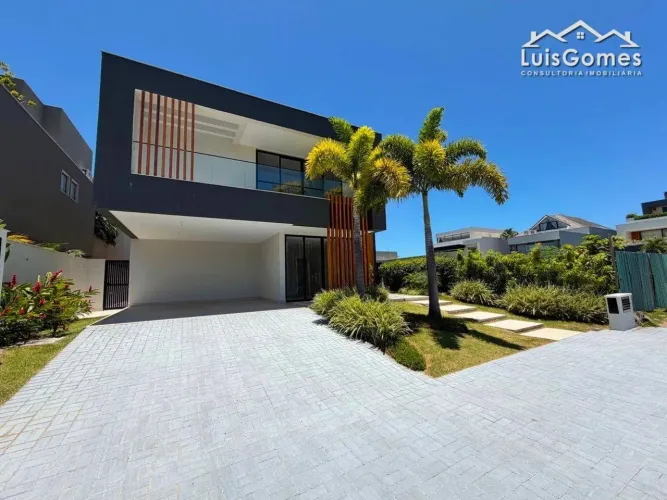 CASA TRIPLEX COM 5 SUITES NO CONDOMÍNIO ALPHAVILLE NA BARRA DA TIJUCA.