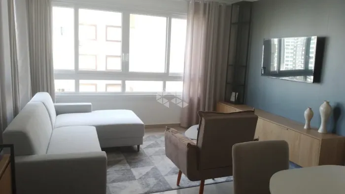 Apartamento de 3 dormitórios sendo 1 suíte mobiliado na Zona Nova de Capão da Canoa