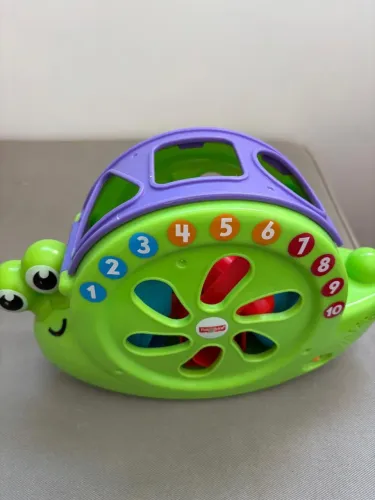 Caracol fisher price musica/blocos