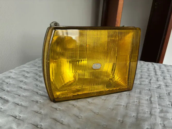 Farol Gol BX Cibié lado esquerdo