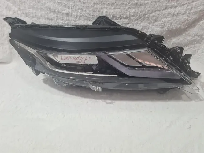 Farol L200 triton20/22 eletr: c/ motor LD