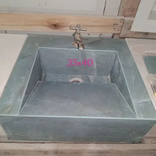 Temos pias esculpida em porcelanato
