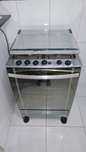 Vendo fogão 4 bocas mesa de inox e vidro espelhado aceito cartão