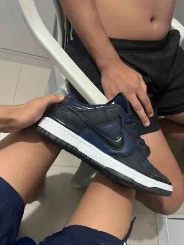 tenis Nike Dunk Low Twist na cor preto e azul.
