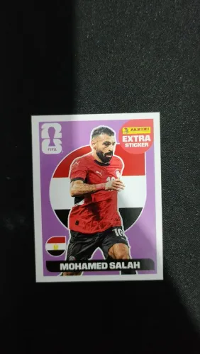 FIGURINHA EXTRA STICKER - LEGEND MOHAMED SALAH LILÁS <br>+200<br>+200<br>+200<br>+100